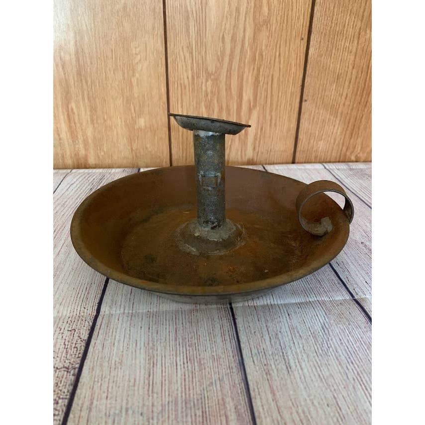 rusty vintage finger candlestick holder 