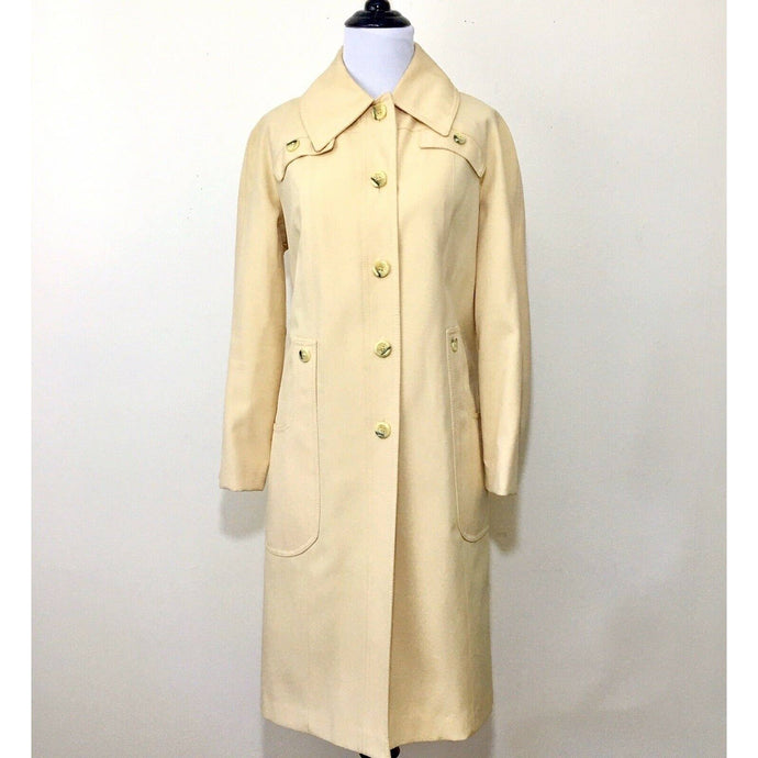 Classic light yellow poly button-down trench coat in excellent condition 
